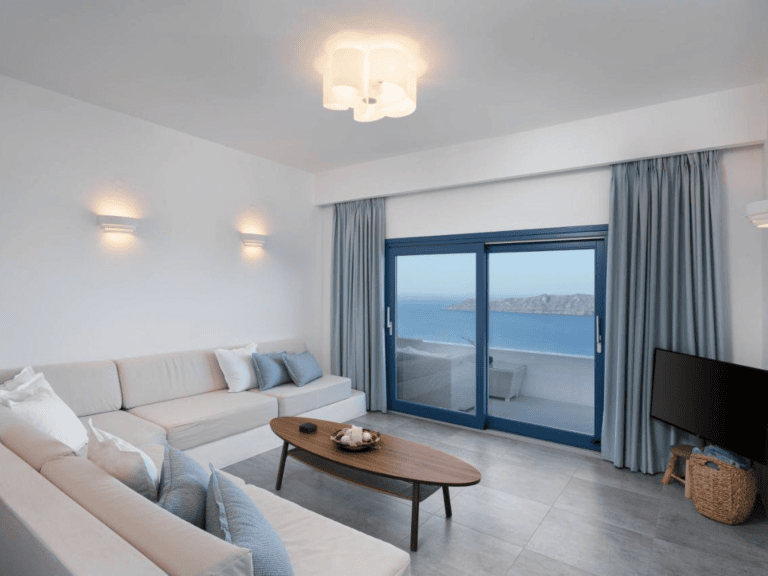 Spacious living room at Santorini secret villa with Aegean view