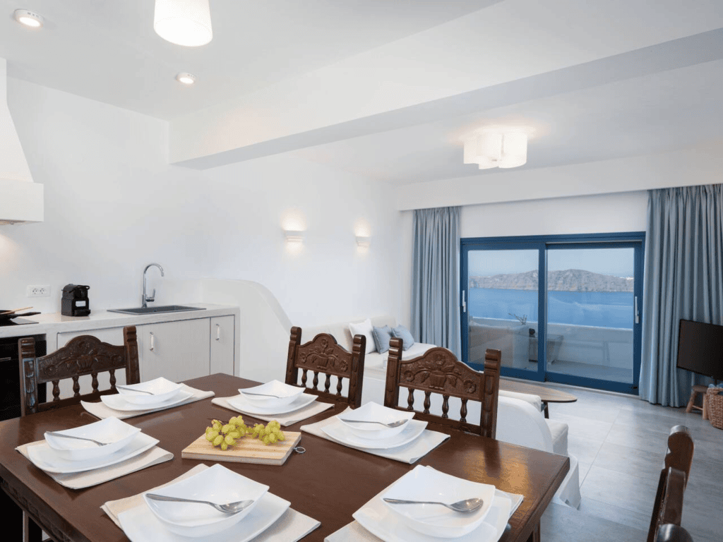 Bright kitchen and dining space in Santorini secret villa