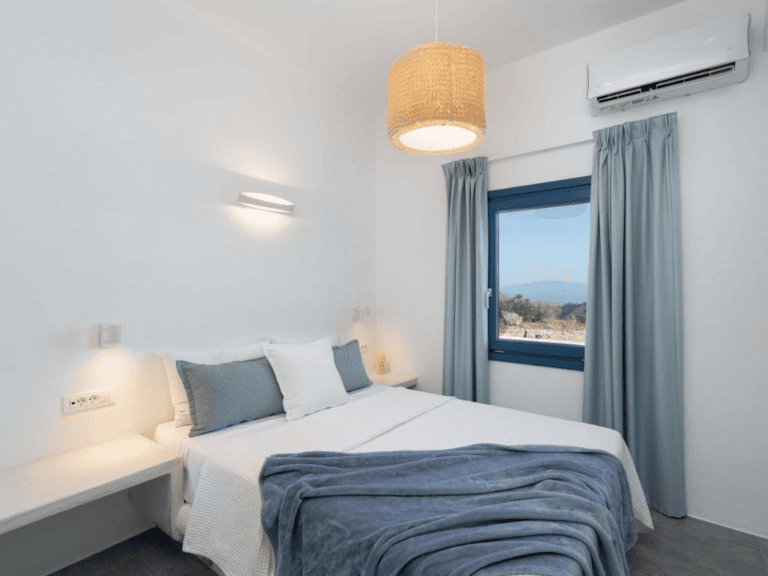 Smart TV and amenities in Santorini secret villa Aetheras bedroom