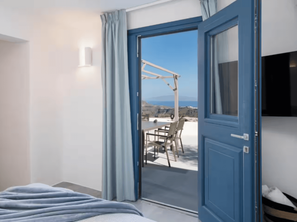 Ikaros master bedroom at Santorini secret villa with smart TV